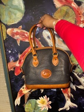 Dooney & Bourke Black Pebbled Leather Satchel with Brown Trim